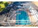 Enclosed pool with spa area, viewed from above at 30812 Top Of The Hill Dr, Mount Dora, FL 32757