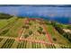 Aerial view of a large lakefront lot ready to build on at 38230 Yale Cir, Leesburg, FL 34788