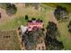 Aerial view of home with tile roof and large lot at 38230 Yale Cir, Leesburg, FL 34788