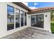 House exterior, showcasing patio and lake view at 38230 Yale Cir, Leesburg, FL 34788