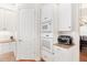 White kitchen with built-in wall oven and microwave at 38230 Yale Cir, Leesburg, FL 34788