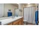 Bathroom with single vanity and shower/tub combo at 41 Camino Real Blvd # 41, Howey In The Hills, FL 34737