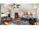 Relaxing living room with hardwood floors, comfortable seating, and a ceiling fan at 41 Camino Real Blvd # 41, Howey In The Hills, FL 34737