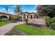 Marbella Spa entrance with lush landscaping at 41 Camino Real Blvd # 41, Howey In The Hills, FL 34737