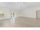 Large living area with light wood floors and high ceilings at 5009 Harbor Hts, Lady Lake, FL 32159