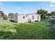Well-maintained backyard with lush green grass at 712 Tarrson Blvd, The Villages, FL 32159