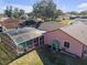 Aerial view showing house and pool area at 7715 Indian Ridge N Trl, Kissimmee, FL 34747