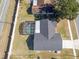 Aerial view of house and surrounding area at 7715 Indian Ridge N Trl, Kissimmee, FL 34747