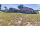 Spacious backyard with pool and screened enclosure at 7715 Indian Ridge N Trl, Kissimmee, FL 34747
