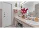 Bathroom with double vanity and walk-in shower at 7715 Indian Ridge N Trl, Kissimmee, FL 34747