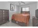 Bright bedroom with double bed and dresser at 7715 Indian Ridge N Trl, Kissimmee, FL 34747