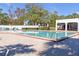 Inviting community pool with ample seating at 7715 Indian Ridge N Trl, Kissimmee, FL 34747