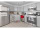 Galley kitchen with stainless steel appliances at 7715 Indian Ridge N Trl, Kissimmee, FL 34747