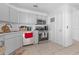 Galley kitchen with stainless steel appliances at 7715 Indian Ridge N Trl, Kissimmee, FL 34747