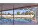 Relaxing kidney-shaped pool with screened enclosure at 7715 Indian Ridge N Trl, Kissimmee, FL 34747