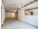 Dining room with chandelier and carpet flooring adjacent to living area at 108 Costa Mesa Dr, Lady Lake, FL 32159