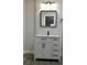 Modern bathroom with white vanity and black accents at 11 The Crescent, Minneola, FL 34715