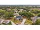An aerial view showcasing the house's location and surrounding neighborhood at 14701 Timucua Pl, Clermont, FL 34711
