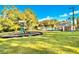 Community pool and playground with shaded pavilion at 14701 Timucua Pl, Clermont, FL 34711
