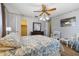 Bright bedroom with a comfortable bed and plenty of closet space at 1621 Texas Ct, Tavares, FL 32778