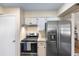 Modern kitchen with stainless steel appliances and ample counter space at 1621 Texas Ct, Tavares, FL 32778