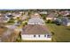 Aerial view of house and neighborhood, showcasing the home's location at 2249 Quincy Ct, The Villages, FL 32162