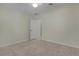 Spacious bedroom with tile floor and private access at 2249 Quincy Ct, The Villages, FL 32162