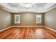 Spacious bedroom featuring hardwood floors and neutral-toned walls at 2380 Bachman Path, The Villages, FL 32162