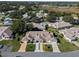 Aerial view of home and neighborhood at 26613 Racquet Cir, Leesburg, FL 34748