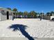 Beach volleyball court with sand and a net at 4094 Lana Ave, Davenport, FL 33897