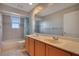 Bathroom with double vanity, bathtub, and shower at 4236 Fawn Meadows Cir, Clermont, FL 34711