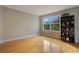 Bright bedroom with hardwood floors and large window at 4236 Fawn Meadows Cir, Clermont, FL 34711