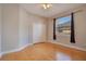 Bright bedroom with wood floors and double door closet at 4236 Fawn Meadows Cir, Clermont, FL 34711