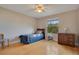 Cozy bedroom with hardwood floors and ample natural light at 4236 Fawn Meadows Cir, Clermont, FL 34711