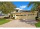 Two-car garage and attractive curb appeal at 4236 Fawn Meadows Cir, Clermont, FL 34711