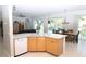 Kitchen with island, granite countertops, and views of pool at 4236 Fawn Meadows Cir, Clermont, FL 34711