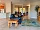 Spacious living room with a view into the dining area at 4236 Fawn Meadows Cir, Clermont, FL 34711