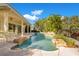 Stunning freeform pool with rock waterfall features at 4236 Fawn Meadows Cir, Clermont, FL 34711