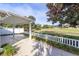 Patio with pergola overlooking a golf course at 8827 Se 168Th Tailfer St, The Villages, FL 32162