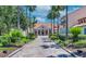 Elegant community clubhouse with a brick paved driveway at 955 Ladera Ranch Rd, Kissimmee, FL 34759