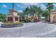 Community entrance with welcoming signage and landscaping at 955 Ladera Ranch Rd, Kissimmee, FL 34759
