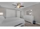Spacious bedroom with a queen bed and dresser at 1150 Blarney St, Minneola, FL 34715