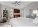 Main bedroom with built-in wet bar and large windows at 1150 Blarney St, Minneola, FL 34715