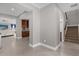 Spacious entryway with tile flooring and views to living area and stairs at 1150 Blarney St, Minneola, FL 34715