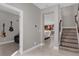 Inviting entryway with views into the living area and staircase at 1150 Blarney St, Minneola, FL 34715