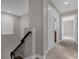 Upstairs hallway with access to bedrooms and bathrooms at 1150 Blarney St, Minneola, FL 34715
