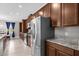 Modern kitchen with stainless steel appliances and granite countertops at 1150 Blarney St, Minneola, FL 34715
