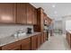 Spacious kitchen featuring ample cabinetry and granite countertops at 1150 Blarney St, Minneola, FL 34715
