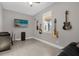 Home office featuring a desk, comfortable seating, and guitars at 1150 Blarney St, Minneola, FL 34715