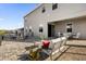 Large patio with fire pit and seating area at 1150 Blarney St, Minneola, FL 34715